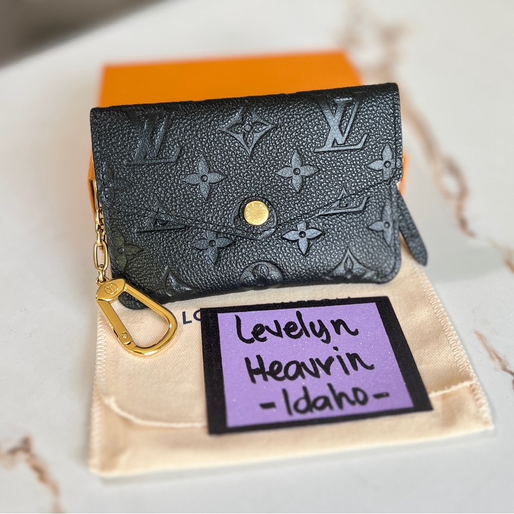 SOLD-Authentic Louis Vuitton Key Pouch Mng Empreinte Black
